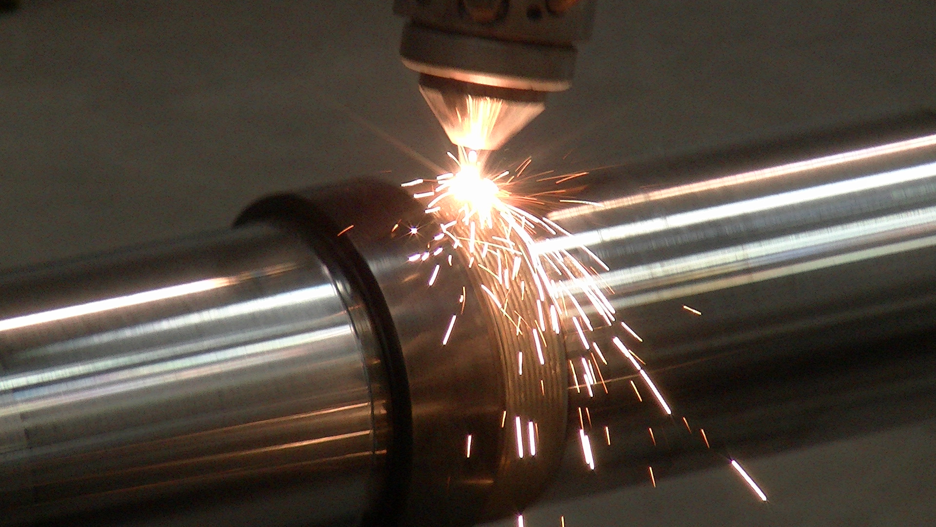 Laser cladding steel mill shaft